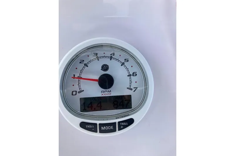 Slide: The Image of Tachometer of 2005 Donzi 35 ZF Daytona showing RPM and voltage readings. - 53