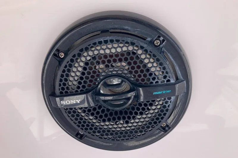 Slide: The Image of Sony marine speaker on 2005 Donzi 35 ZF Daytona boat, featuring a protective grille design. - 54