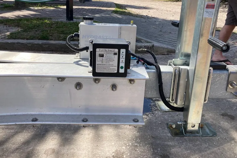 Slide: The Image of Boat lift mechanism with control box, associated with a 2005 Donzi 35 ZF Daytona. - 57