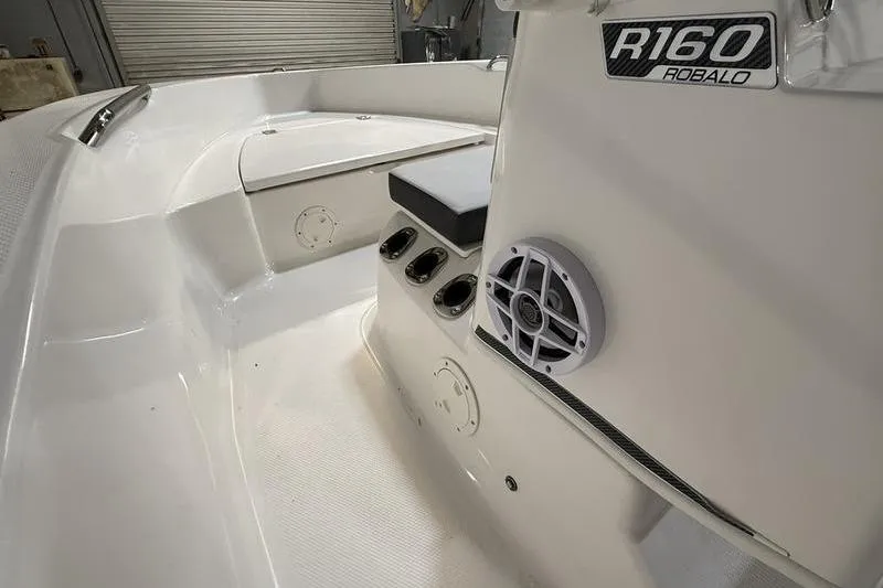 Slide: The Image of Interior view of 2026 Robalo R160 Center Console boat. - 15