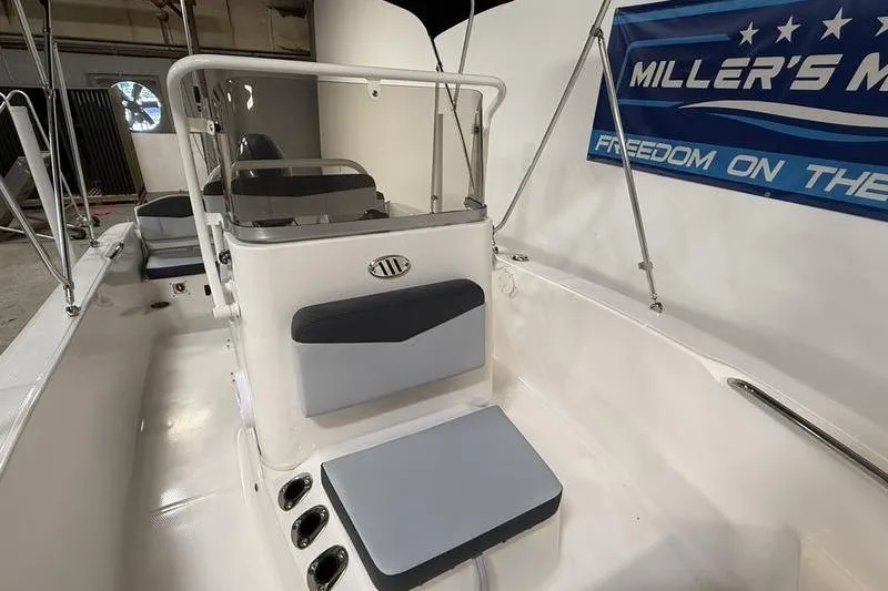 Slide: The Image of Interior view of the 2026 Robalo R160 Center Console boat. - 17