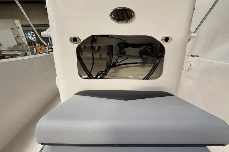 Slide: The Image of Robalo R160 Center Console 2026, interior view with seat and controls. - 18