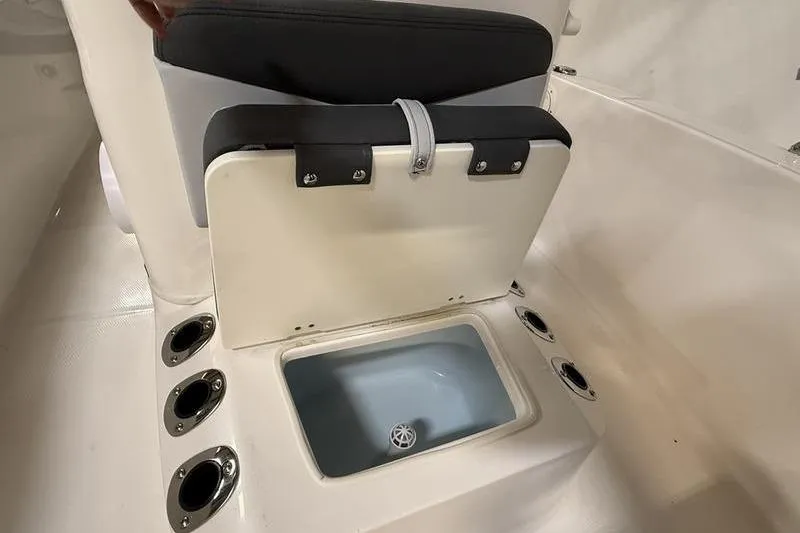 Slide: The Image of Robalo R160 Center Console 2026 with integrated storage and seating. - 19