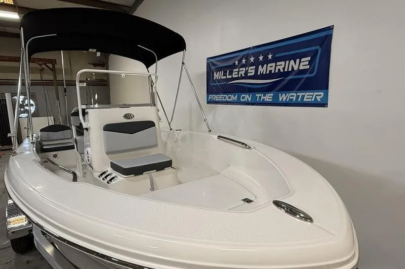 Slide: The Image of 2026 Robalo R160 Center Console boat at Miller's Marine. - 2