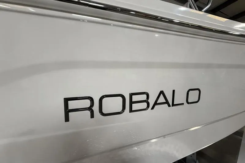 Slide: The Image of 2026 Robalo R160 Center Console boat side with logo. - 4