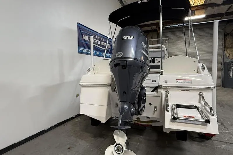 Slide: The Image of 2026 Robalo R160 Center Console with 90 HP outboard motor. - 5