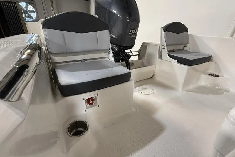 Slide: The Image of Interior view of 2026 Robalo R160 Center Console boat. - 9