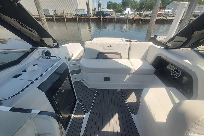 Slide: The Image of 2017 Monterey 298SS Super Sport boat interior with seating and sleek design. - 11