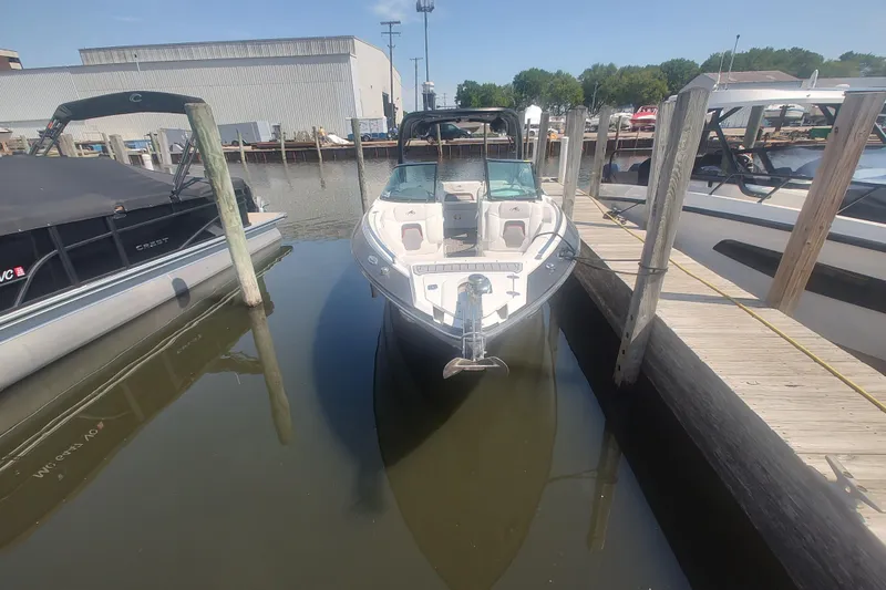 Slide: The Image of 2017 Monterey 298SS Super Sport boat docked at marina, front view. - 6