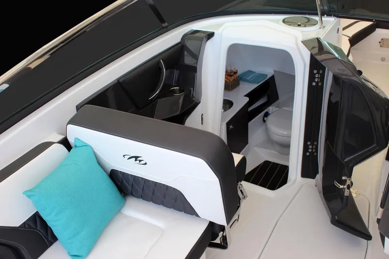 Slide: The Image of Manufacturer Provided Image: 2017 Monterey 298SS Super Sport boat interior with seating and cabin amenities. - 7
