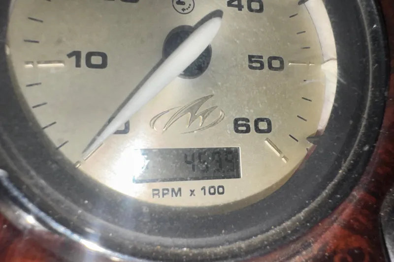 Slide: The Image of Close-up of a 2005 Monterey 248LS Montura Bowrider tachometer displaying 403.9 RPM x 100. - 26