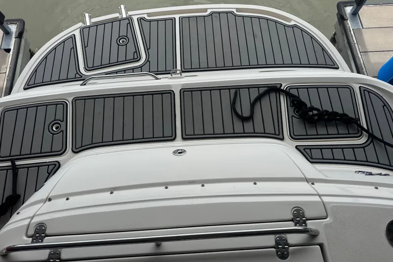 Slide: The Image of 2005 Monterey 248LS Montura Bowrider swim platform with black non-slip decking. - 28