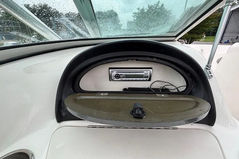 Slide: The Image of Dashboard of a 2011 Sea Ray 205 Sport boat with stereo system. - 18