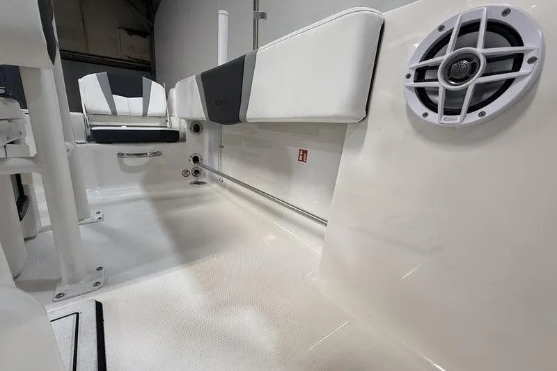 Slide: The Image of Interior of 2026 Robalo R180 Center Console with speaker and seating. - 13