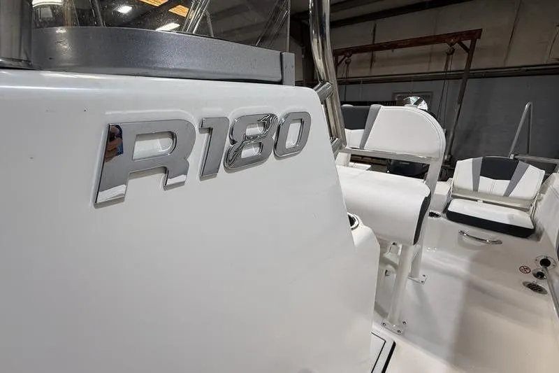 Slide: The Image of 2026 Robalo R180 Center Console boat interior view. - 14