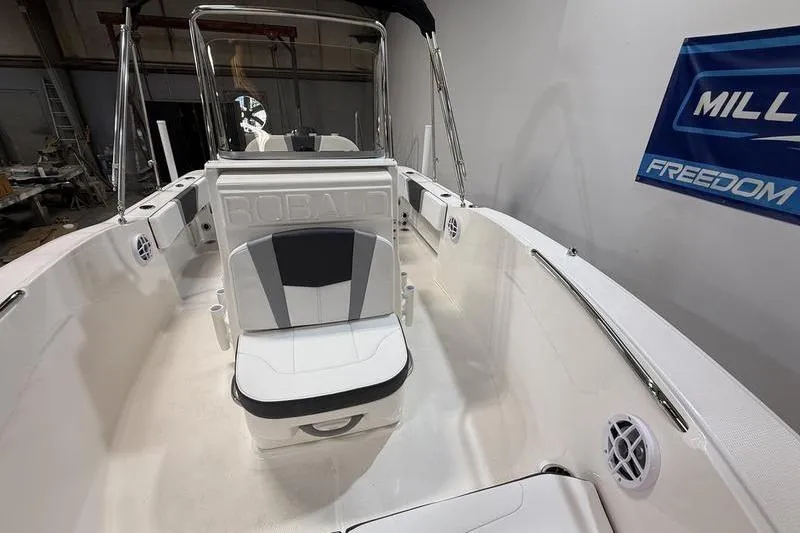 Slide: The Image of Interior view of the 2026 Robalo R180 Center Console boat. - 17