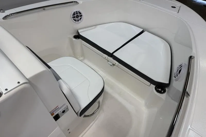 Slide: The Image of Interior of 2026 Robalo R180 Center Console with white seating. - 18