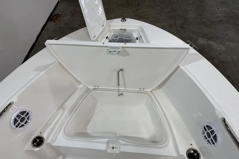 Slide: The Image of 2026 Robalo R180 Center Console with open storage and speakers. - 20