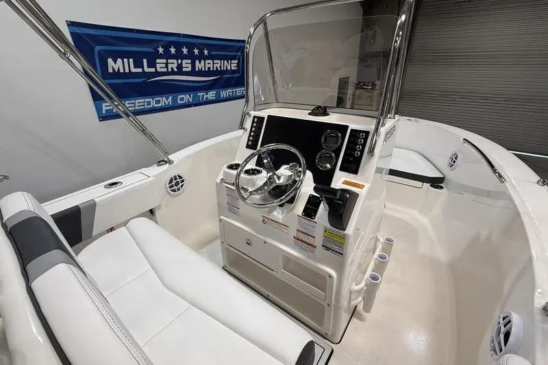 Slide: The Image of Interior view of 2026 Robalo R180 Center Console boat. - 8