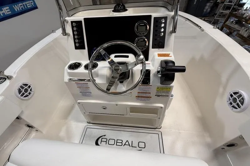 Slide: The Image of Interior view of 2026 Robalo R180 Center Console boat. - 9