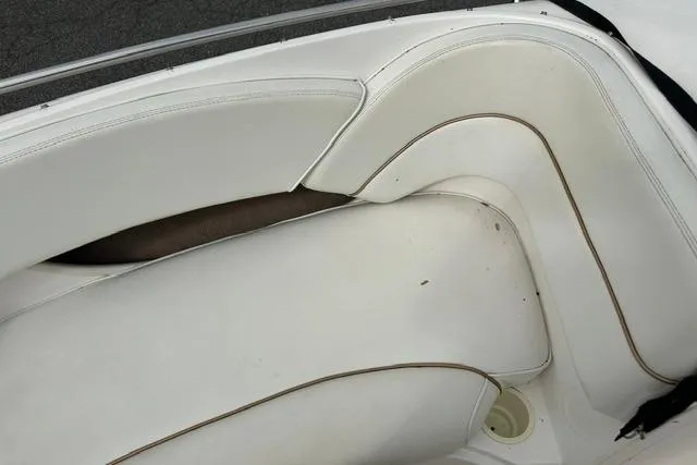 Slide: The Image of Interior of a 1998 Sea Ray 210 Bow Rider boat. - 11
