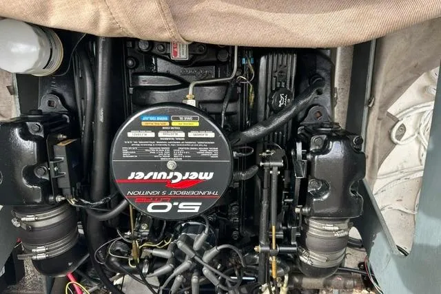 Slide: The Image of Engine of a 1998 Sea Ray 210 Bow Rider boat. - 18