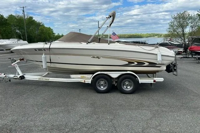Slide: The Image of 1998 Sea Ray 210 Bow Rider on trailer, side view. - 6