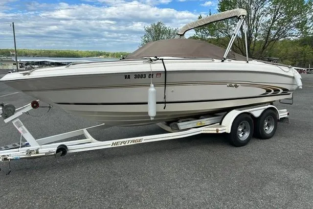 Slide: The Image of 1998 Sea Ray 210 Bow Rider on trailer, side view. - 7