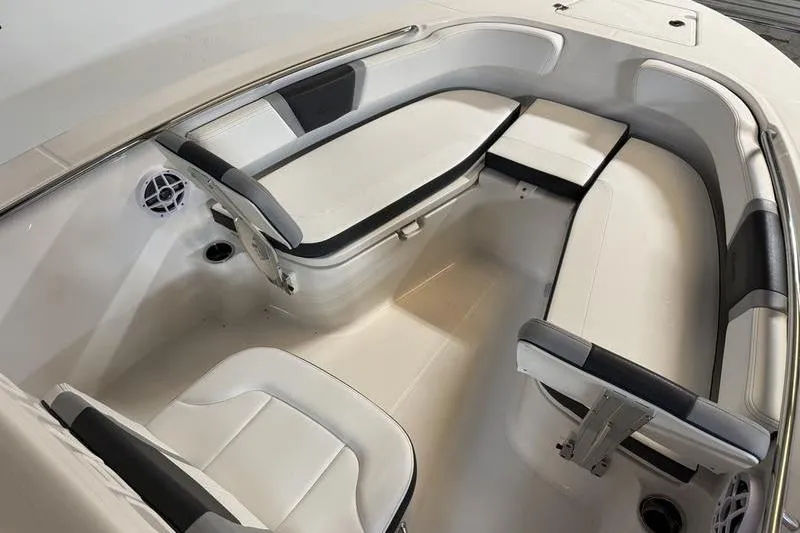 Slide: The Image of 2026 Robalo R200 Center Console boat interior with cushioned seating and sleek design. - 16