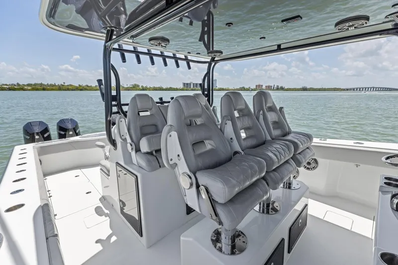 Slide: The Image of Luxury seating on a 2020 Freeman 42LR boat, with scenic water view. - 22