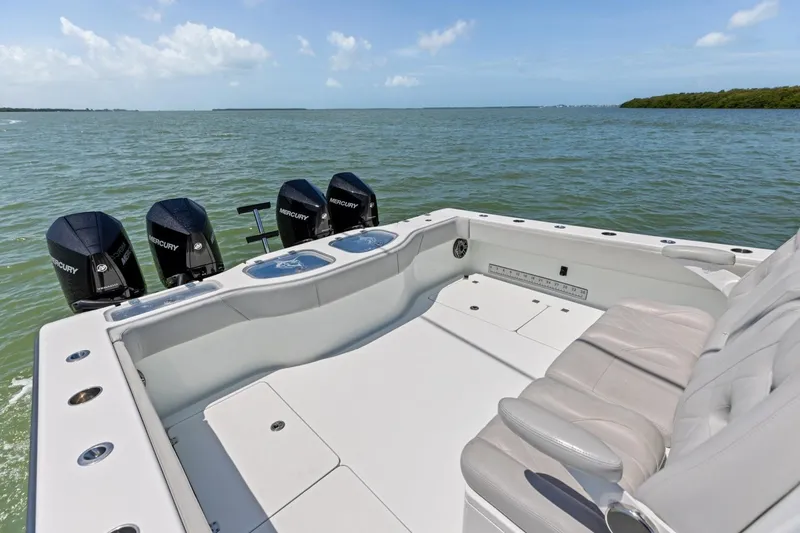 Slide: The Image of Freeman 42LR 2020 boat with Mercury engines on open water. - 26