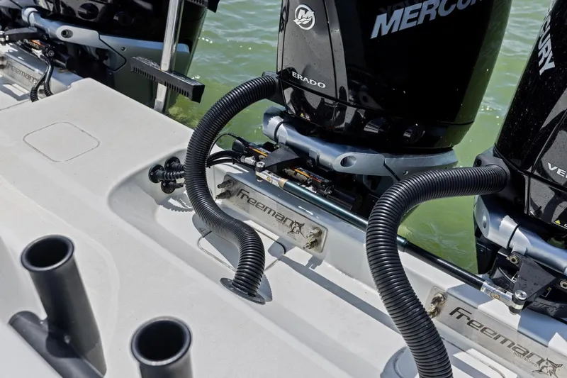 Slide: The Image of Freeman 42LR 2020 boat with Mercury engines on water. - 30
