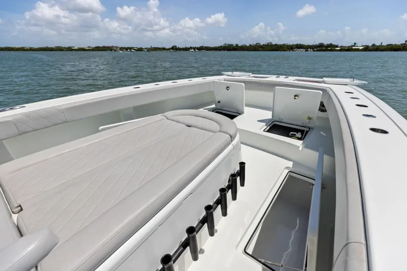 Slide: The Image of 2020 Freeman 42LR boat interior with cushioned seating and storage compartments. - 40