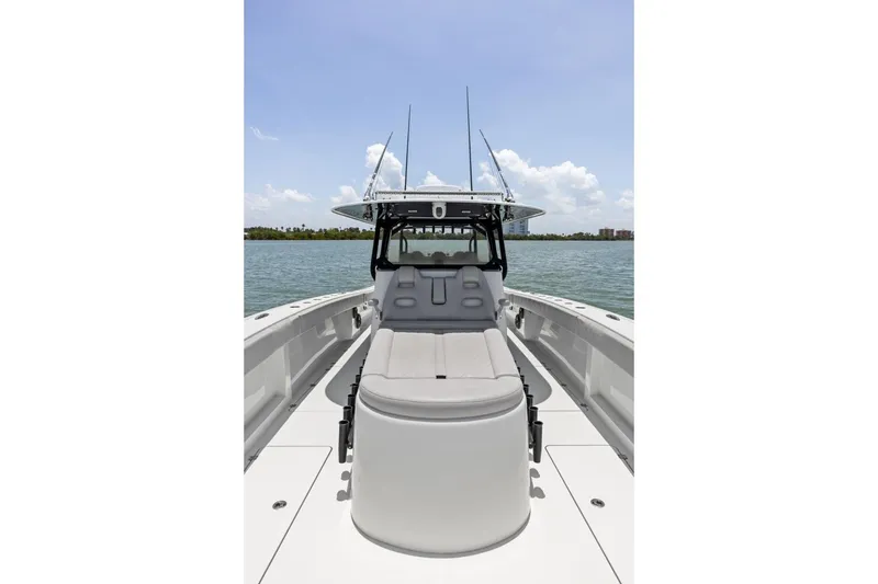 Slide: The Image of Freeman 42LR 2020 boat on water, showcasing spacious deck and seating. - 54