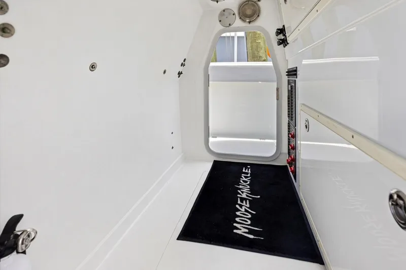 Slide: The Image of Interior of a 2020 Freeman 42LR boat with a "Moose Knuckle" mat. - 55