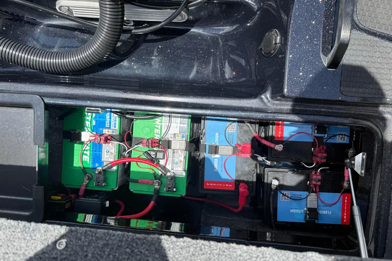 Slide: The Image of Battery compartment of 2026 Phoenix 921 Elite X II with multiple connected batteries. - 14