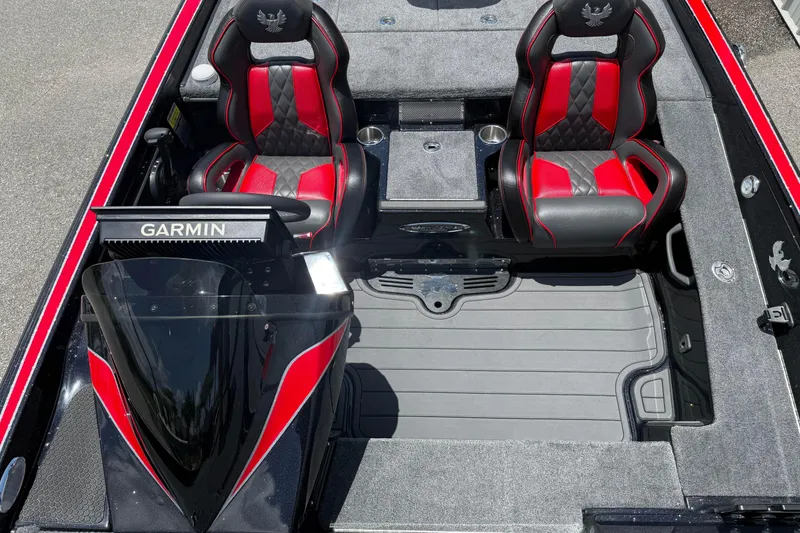 Slide: The Image of 2026 Phoenix 921 Elite X II boat interior with red and black seats, Garmin display. - 16