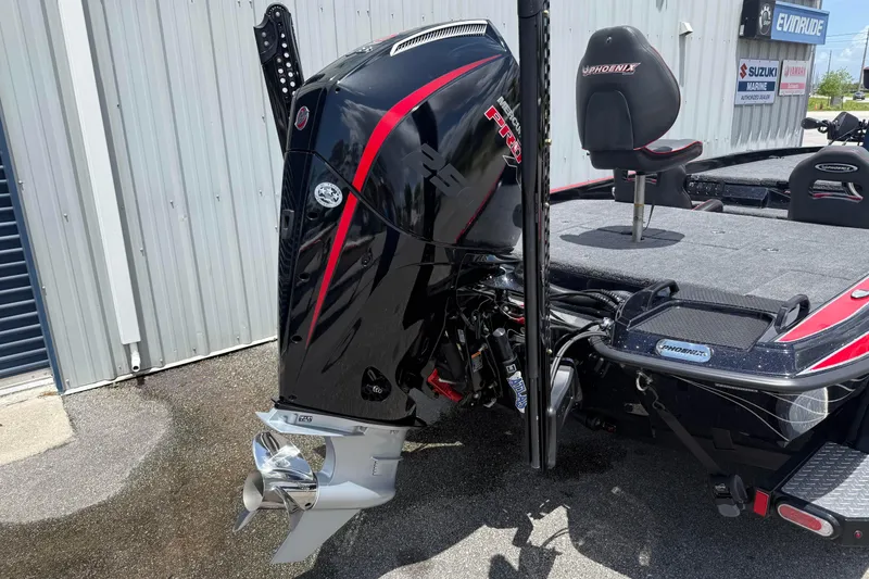 Slide: The Image of 2026 Phoenix 921 Elite X II boat with powerful outboard motor and sleek design. - 5