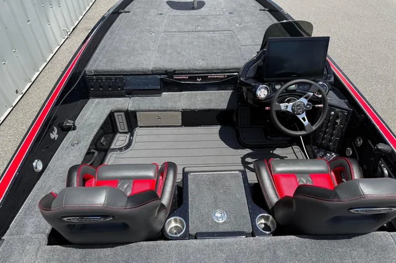 Slide: The Image of 2026 Phoenix 921 Elite X II boat interior with dual seats and advanced dashboard. - 6