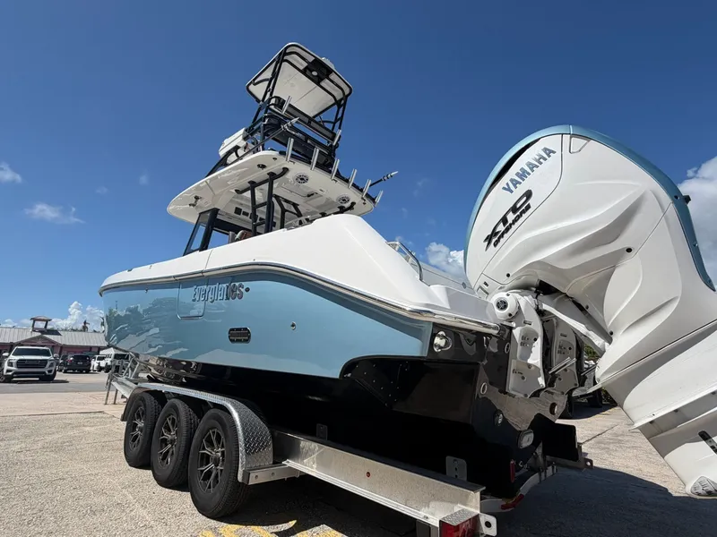 Slide: The Image of 2024 Everglades 335 Center Console boat with Yamaha engine. - 12
