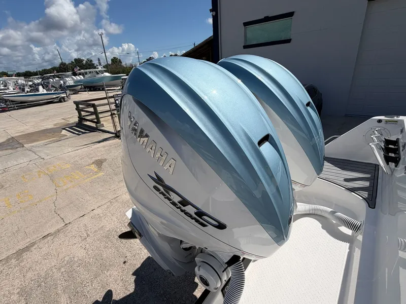 Slide: The Image of 2024 Everglades 335 Center Console with Yamaha outboard engines. - 18