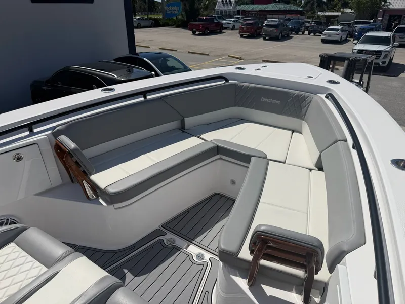 Slide: The Image of 2024 Everglades 335 Center Console with luxurious seating arrangement. - 41