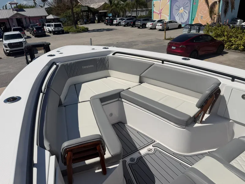 Slide: The Image of 2024 Everglades 335 Center Console with luxurious seating area. - 42