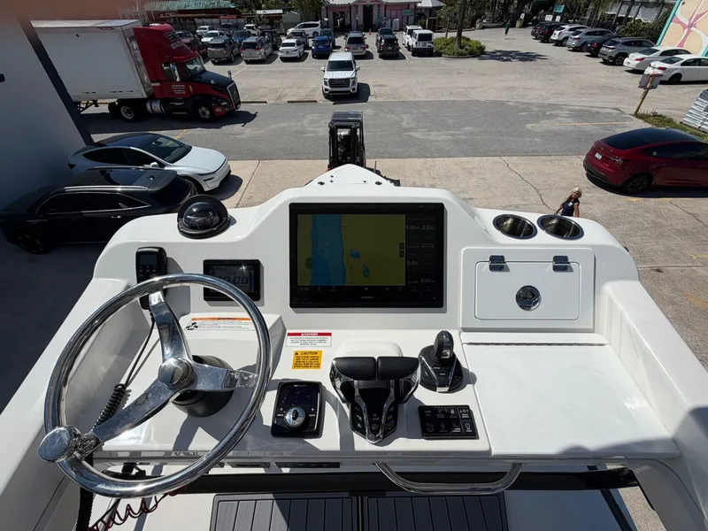Slide: The Image of Helm console of 2024 Everglades 335 Center Console boat. - 49