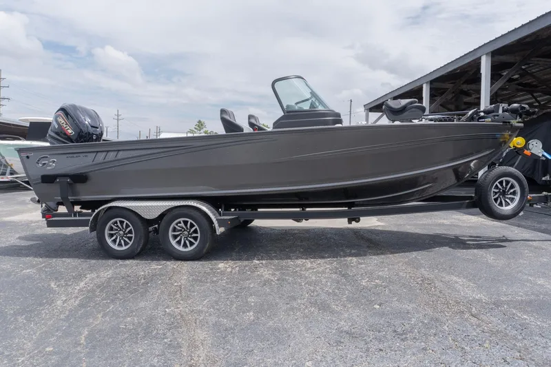 The Image of 2026 G3 Angler V21 F fishing boat on trailer, parked outdoors. - 0