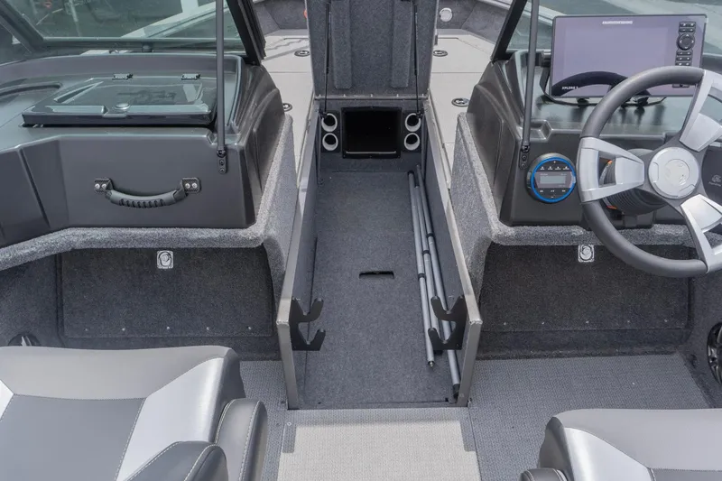 Slide: The Image of Interior of 2026 G3 Angler V21 F boat, featuring steering wheel and storage compartments. - 10