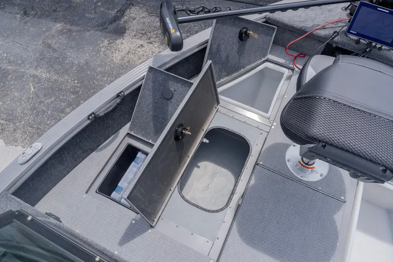 Slide: The Image of 2026 G3 Angler V21 F boat interior with storage compartments and seating. - 12
