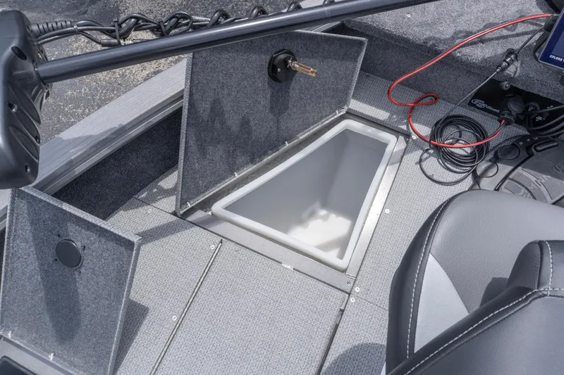 Slide: The Image of 2026 G3 Angler V21 F boat interior with open storage compartment and fishing equipment. - 15