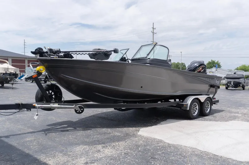 Slide: The Image of 2026 G3 Angler V21 F fishing boat on trailer. - 2