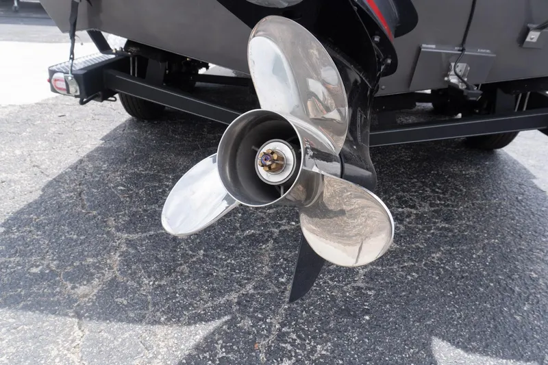 Slide: The Image of 2026 G3 Angler V21 F boat motor propeller on asphalt. - 5